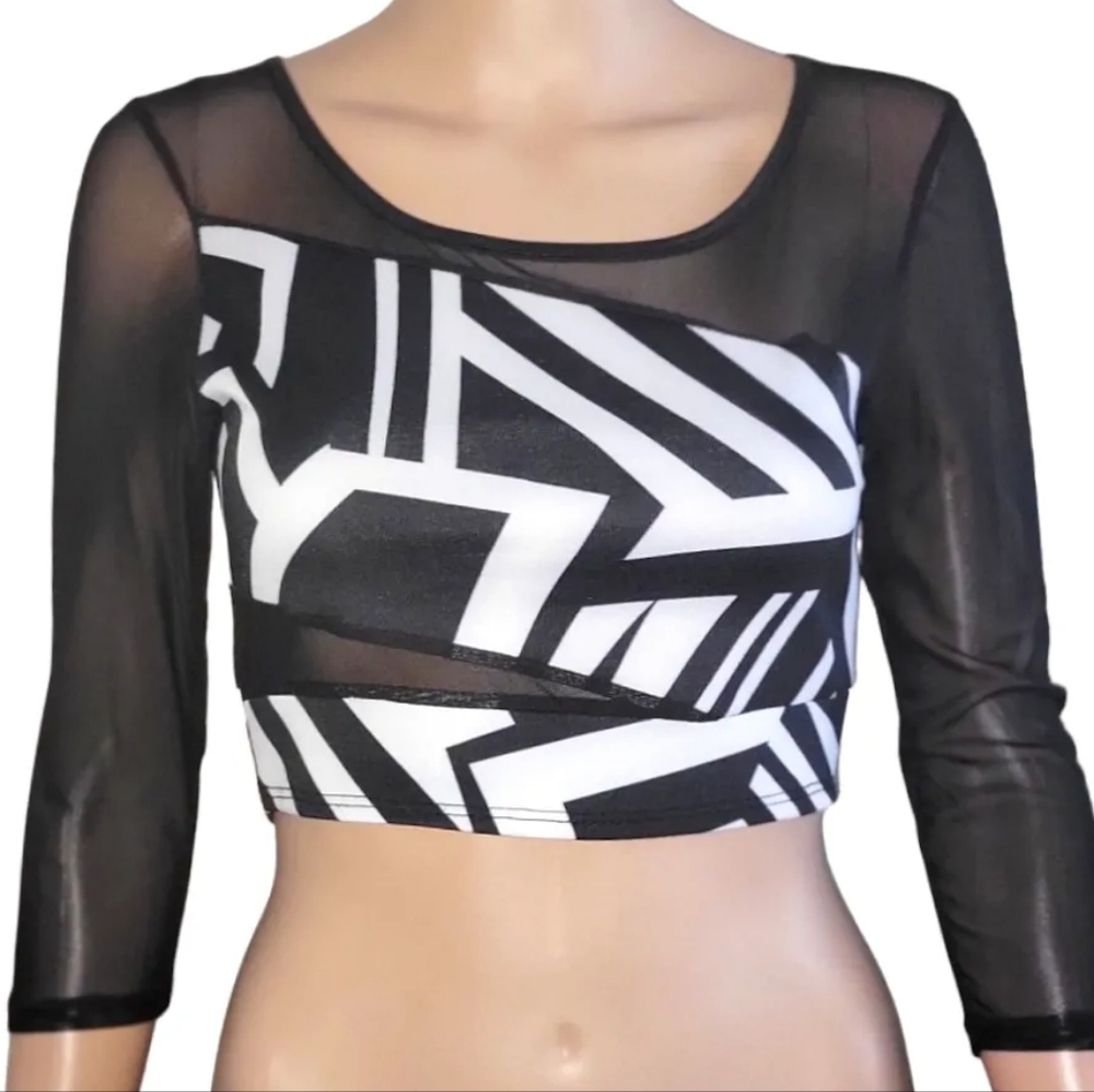 Black and white 3/4 sleeve sheer top with back button closure.
